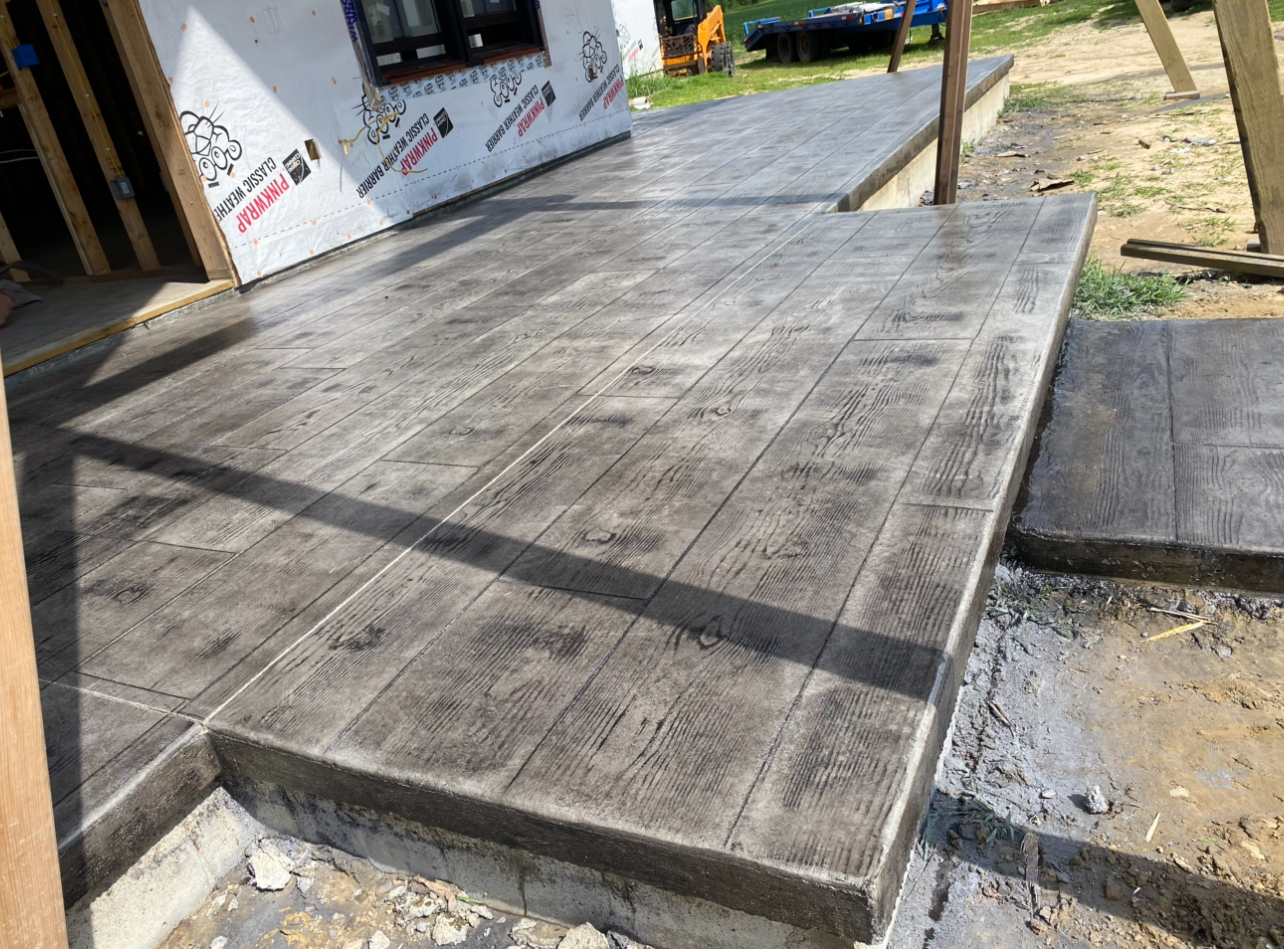 Stamped concrete patio with wood grain finish